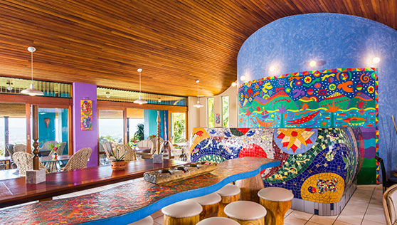 Restaurant and bar interiors with colorful art and sculpture